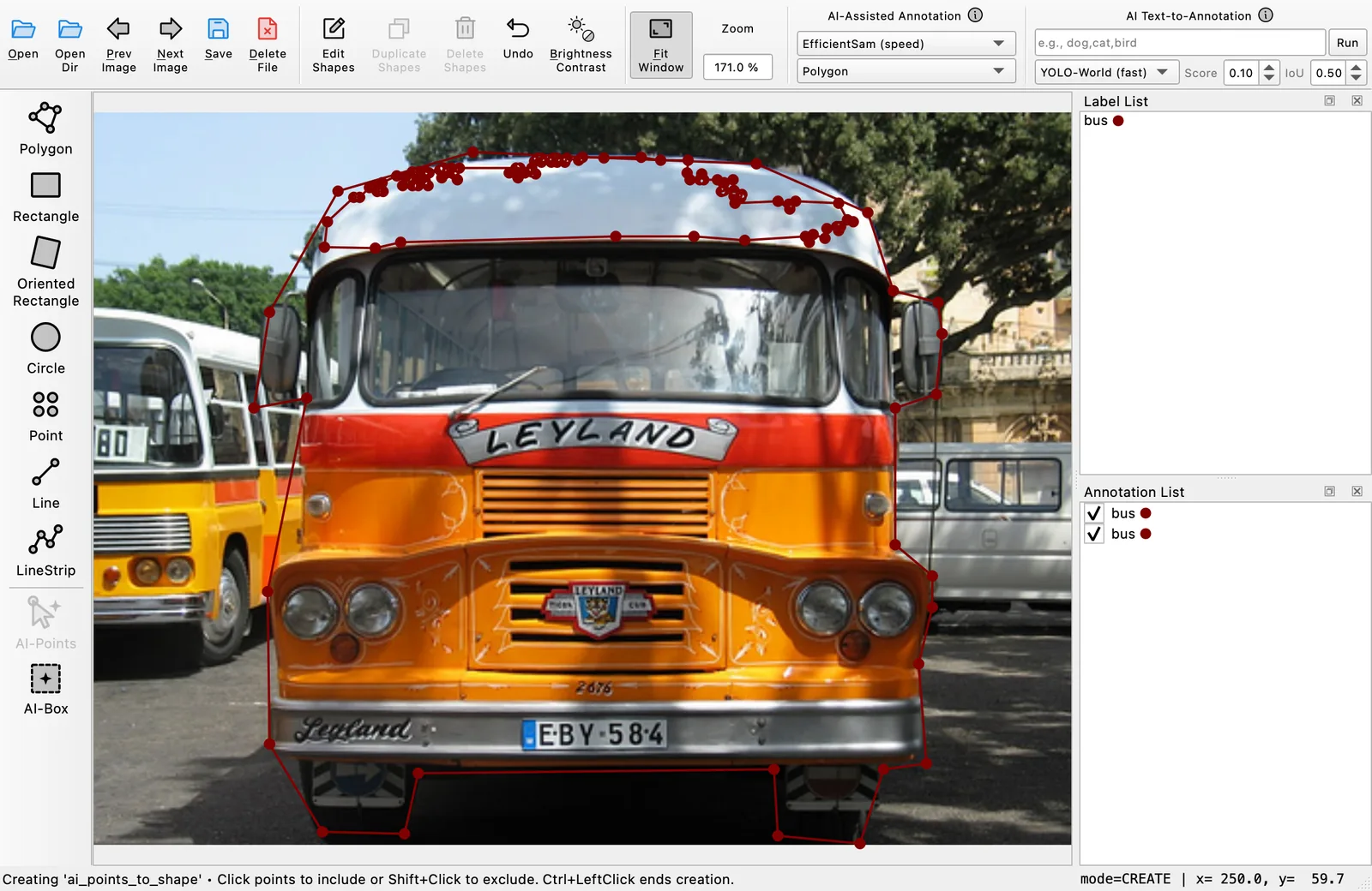 Offscreen Labelme canvas showing an orange vintage bus under two overlapping red outlines, the coarse hand-drawn polygon and the denser AI prediction, with the Annotation List holding two bus entries.