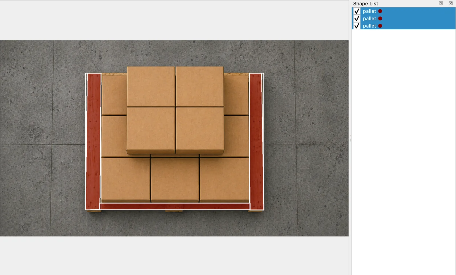 Offscreen Labelme v7.5.0 render showing three selected red mask fragments on the exposed wooden pallet around stacked boxes, with three pallet entries in the Shape List.